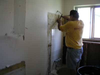 Terry taking apart the old bathroom