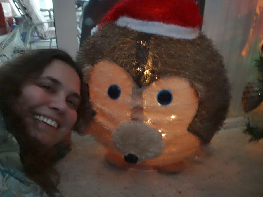 Kari Sanders (Kari Sue Rawluk) with the Christmas Hedgehog